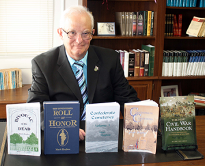 hughes-with-books-nov16